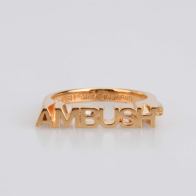 Ambush Nameplate Ring in Gold.- Large logo lettering.- 100% Brass. Ref: BWOC0220017600.
