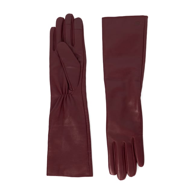 Embrace elegance this winter with Impressive. Crafted from the finest leather, these gloves feature sophisticated ruched details at the inner wrist, ensuring you stay chic and warm throughout the season. The extended length offers additional coverage, making them as practical as they are stylish.