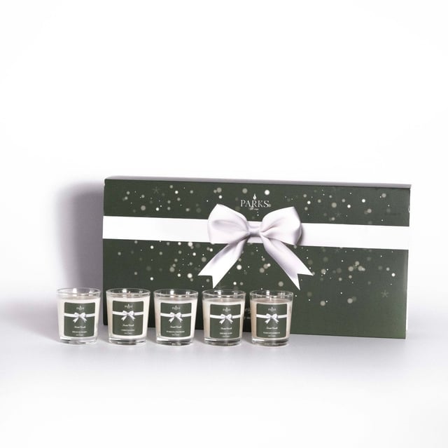 A selection of 10 scented votive candles from our unique range of festive fragrances. This discovery set provides the perfect gift for those looking for something special. Curated using the finest ingredients and 100% natural wax for a strong, long-lasting scent and a clean burn. Discover the magic of the festive season with the Parks Perfect Presents Christmas Discovery Set, featuring 10 exquisite 40g candles. Each candle is thoughtfully curated to encapsulate the essence of Christmas, offering a delightful array of seasonal fragrances that will fill your home with warmth and cheer. This beautifully presented set is perfect for gifting or for indulging yourself during the holidays. Each candle is crafted with high-quality materials, ensuring a clean and long-lasting burn. From the comforting scent of spiced cinnamon to the refreshing aroma of winter pine, this collection invites you to explore a variety of enchanting fragrances that celebrate the joy of Christmas. Whether used to create a cozy atmosphere for gatherings or as a personal treat, the Parks Perfect Presents Christmas Discovery Set is a wonderful way to enhance your holiday spirit and create lasting memories. Ideal for family, friends, or as a festive addition to your own home, this candle set brings the warmth and joy of the season right into your living space. 2 x Christmas Pine, Spiced Mandarin, Warm Gingerbread, Sparkling Cranberries, Fireside Glow