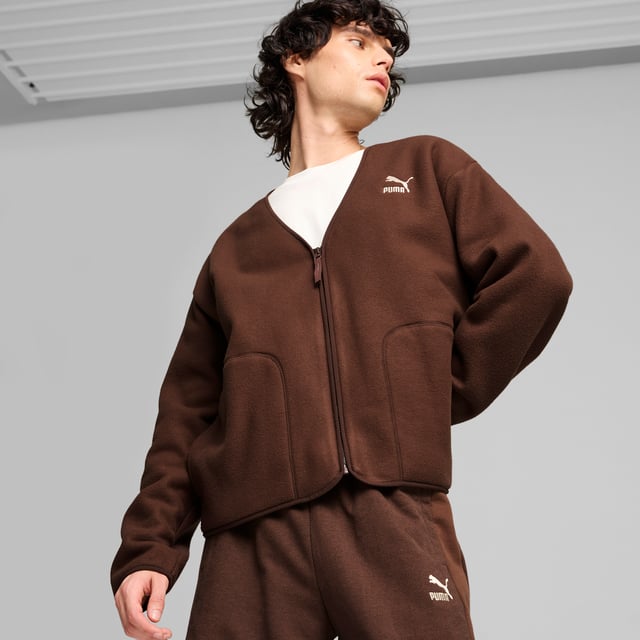 PRODUCT STORY: Make a statement in premium comfort and style. This full-zip cardigan delivers a relaxed yet refined fit, perfectly suited for life's everyday adventures. Thoughtfully designed details like the contrast zipper and subtle stitching on the cuffs add an elevated finish, keeping you looking sharp whether wandering the city or escaping to the countryside. FEATURES & BENEFITS: Made with at least 90% recycled materials; warmCELL: Breathable cold weather technology designed to trap heat close to your body and keep you warm during exercise. DETAILS: Relaxed fit; 270 gsm, polar fleece; V-neck; Button placket; Top stitching design element.  Our model is  180 cm tall and is wearing size  M UK.