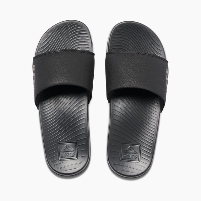 Summer feel too short? These incredibly comfy injection molded slides are a quick fix: with anatomic contouring, a soft padded strap for easy on and off, a non-marking outsole and enhanced biodegradability. Make every day feel like summer.