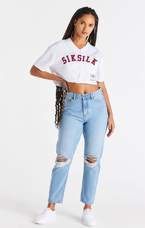 inchWhite Baseball Crop JerseyCrop fitSoft touch fabricApplique branded logoWoven badge brandingButton frontMachine wash100% PolyesterModel 5ft 7in and wears a size XS inch