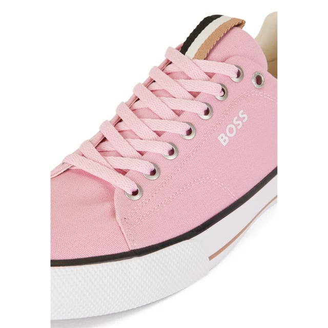 Men's BOSS Aiden Tennis Trainers. Sleek, low profile, BOSS' Aiden tennis trainers are crafted from crisp canvas with vulcanised rubber soles to support outdoor impact. The label's signature beige, black and white grosgrain trim is showcased on the tongue.