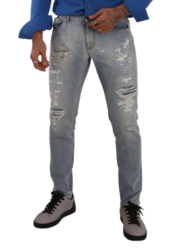 100% Authentic Dolce \u0026 Gabbana tattered denim jeans.\n  Crafted from cotton.\n  Zipper and button closure.\n  Straight fit.\n  Light blue color.\n  Regular fit.\n  Made in Italy.\n  Logo details.\n  Material: 100% Cotton.