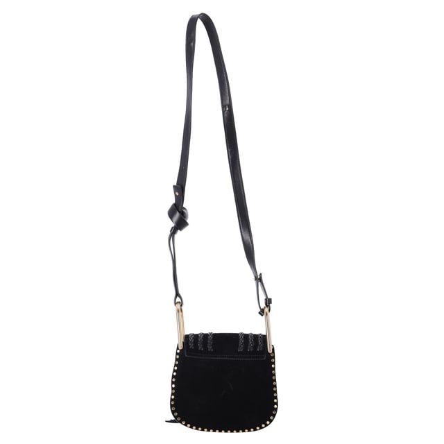 VINTAGE, RRP AS NEW
Embrace effortless bohemian chic with the Chloé Mini Hudson Whipstitch Crossbody Bag in Black Suede. Crafted from luxurious black suede, this miniature version of the iconic Hudson bag offers a sleek and versatile design that pairs perfectly with any outfit. The signature whipstitch detailing and gold-tone hardware add a touch of artisanal elegance, while the adjustable crossbody strap ensures comfort and ease. Compact yet spacious enough to hold your essentials, this crossbody bag brings a refined, laid-back vibe to both day and evening looks. A must-have for fashion-forward individuals who appreciate timeless craftsmanship and understated luxury.

 Chloé Mini Hudson Whipstitch Crossbody Bag in Black Suede

Condition: Excellent
Signs of wear: No retail tag, No visible sign of wear., 
Packaging: None
Color: Black
Material: Suede
Size: One Size | One Size
Measurements: Width: 60; Height: 200; Length: 180; Handle drop: 0; Strap length: 1050
SKU: NAPPUITBA429123W