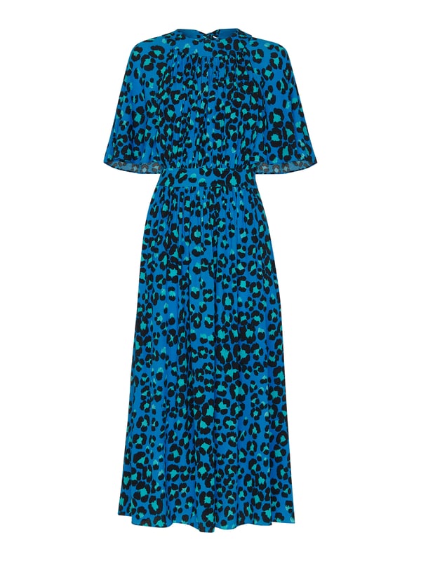 Step out in sustainable style with our 'Painted Leopard Midi Dress', perfect for adding a splash of colour and pattern to your day. Whether enjoying leisure time or dressing up for a casual outing, this eco-conscious piece with its tie neck and comfortable fit brings an effortless flair to any wardrobe.