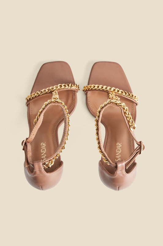 Outfit upgrade, incoming
Head-turning chain embellishment
Wear-with-everything tan leather
For Saturday night drinks or special occasions
Style with a statement dress or elevate jeans and a nice top