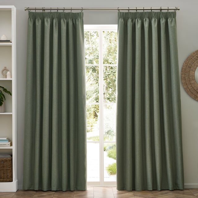 Transform your living space with Dawn Blackout Pencil Pleat Curtains, designed for those who value elegance and practicality. Crafted from soft-textured fabric with a modern marl effect, these curtains add refined style to any room while effectively blocking out light. Perfect for a restful night's sleep or creating the ideal movie-watching environment, their temperature-regulating properties ensure comfort year-round by keeping your home cool in summer and warm in winter. Enjoy the perfect blend of function and style with Dawn Blackout Curtains.