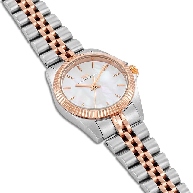 At your clock, do you value timeless optics in conjunction with the quality standards of the old watchmaker's craft? Then this women's model of the Rhodenwald & Sons label is the perfect choice. The clock manufacturer creates stylish and sustainable masterpieces for all generations: the timepiece scores with a tidy dial made of mother-of-pearl, simple barnice, obélisque quarrels and a grooved bezel. The satin-made bicolor stainless steel housing with partial gilding made of rose gold and a tuned link bracelet made of stainless steel fit perfectly into the design concept. A precise quartz clock, a screwed housing floor and water resistance up to 5 ATM complete the premium equipment.