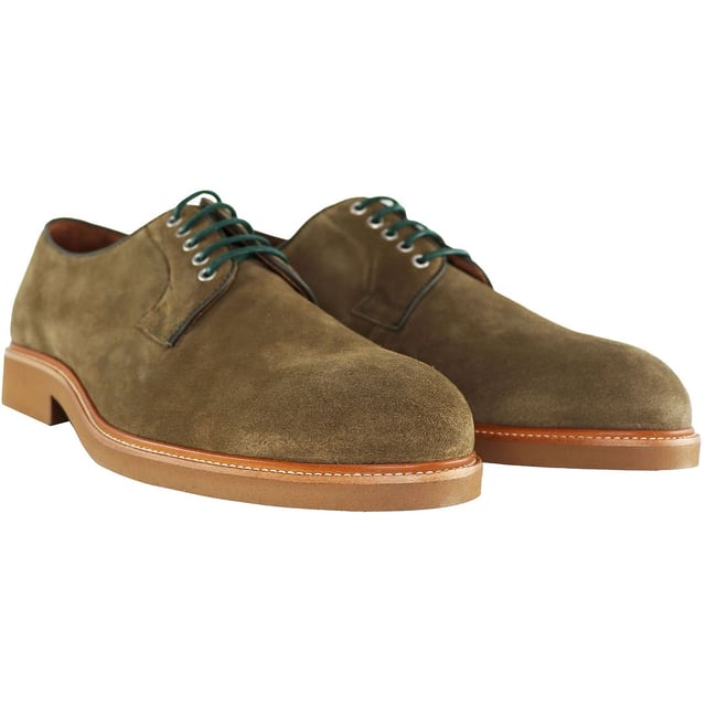 The Hackett Chino Eyelet Blucher Men's Brown Shoes are a stylish and versatile footwear option that seamlessly marries the classic Blucher design with the modern chino style. These shoes offer a blend of sophistication and comfort, making them an excellent choice for various occasions. Here's a description of their key features:

 High-Quality Brown Leather or Suede:  Crafted from premium brown leather or suede, these shoes exude elegance and durability. The material is not only stylish but also ensures longevity.

 Chino-Inspired Design:   These shoes combine the classic Blucher design with a chino-inspired style, creating a unique and eye-catching appearance. The result is a versatile shoe that can effortlessly transition between formal and casual occasions.

 Eyelet Detailing:   The eyelet lacing system not only provides a secure fit but also adds a touch of sophistication to the shoes. It's a classic detail that enhances their overall look.

 Comfortable Insole:   Many of these shoes come with a cushioned insole to ensure comfort during prolonged wear. The insole offers support and reduces foot fatigue.

 Durable Outsole:   The sturdy rubber outsole offers excellent traction and durability, making these shoes suitable for extended use and various weather conditions.

 Versatile Brown Color:   Brown is a versatile and neutral color that pairs well with a wide range of clothing, allowing you to easily match these shoes with your outfits.

 Hackett Branding:   You can often find the discreet Hackett logo or branding on the shoes, signifying their authenticity and quality.