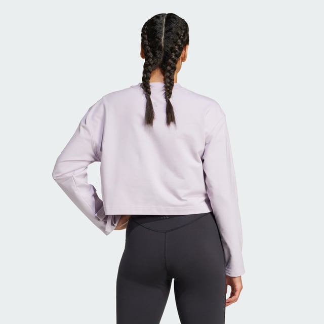 Take your yoga flow from studio to city in this yoga cover-up. Made for comfort inside and out, this soft French terry top keeps you cosy before, during and after your practice. adidas AEROREADY keeps you dry when the heat is on. Slightly cropped and with hem ties, this cover-up layers perfectly over your favourite yoga bra.By choosing recycled, adidas are able to reuse materials that have already been created, which helps to reduce waste. Renewable materials choices will help us to remove our reliance on finite resources. Our products made with a blend of recycled and renewable materials feature at least 70% total of these materials.  -
