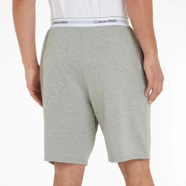Mens Calvin Klein Lounge Shorts in grey.- Branded elasticated waistband.- Regular fit.- Ref: 000NM2303EP7A