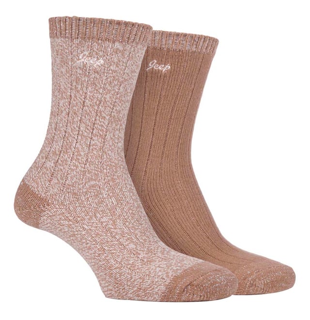 Jeep Socks for Women include all the durable and resilient qualities that the well-reputed brand is known for, but maintain the style and comfort that women have come to expect from their socks. This range of Ladies Jeep socks are perfect for matching your trekking gear, or even if you are looking to update your winter sock collection. Luxuriously soft and silky, these 2 pack Jeep boot socks for ladies are ideal for casual and urban outdoor activities. These super soft socks are made from performance polyester with a layer of terry cushioning for added comfort. The uber soft touch yarn feels warm to the skin and helps to retain warmth. They are are knitted in a classic wide rib pattern that will look fabulous in any pair of boots! For a subtle fashion statement, these socks feature a Lurex glitter cuff design which adds a lovely sparkle to your ensemble! These socks come in a pack of 2. They are made from 97% Polyester 3% Elastane. They are available in sizes 4-8 UK.