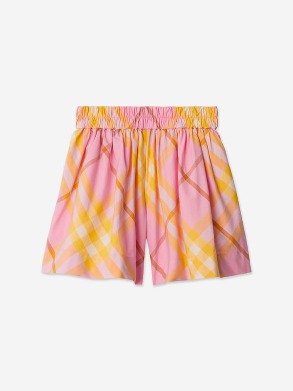 Burberry's exquisite construction and innovative outlook are embodied in these girls Marcy carnation pink check shorts. Crafted in a striking rose and light yellow cotton. The sophisticated jersey texture showcases the recognisable check pattern and elasticated waistband.  Two Side Slit Pockets Thigh-Length 100% Cotton