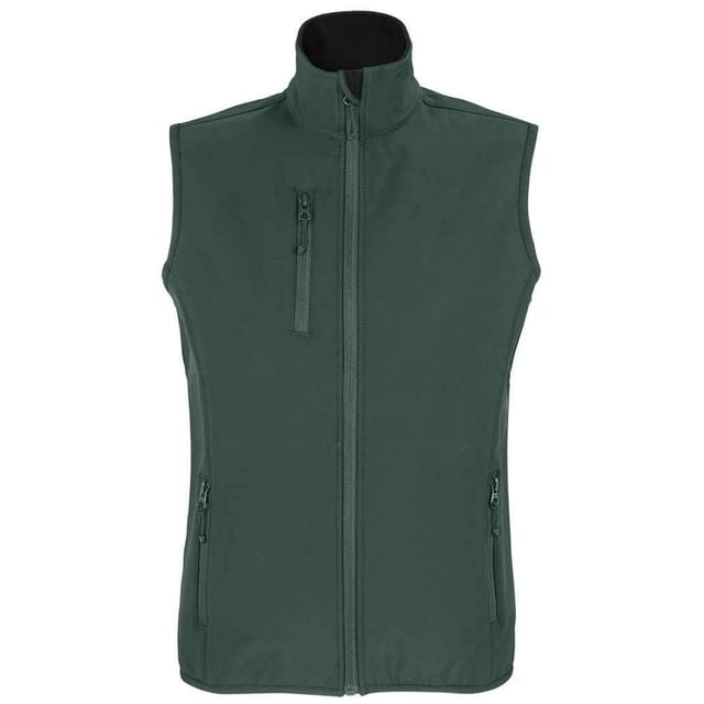Buitenmaterialen: 94% Gerecycleerd Polyester, 6% Elastaan. Voering: Vlies, Polyester. Stof: Softshell. Ontwerp: Eenvoudig. Stoftechnologie: Ademend, waterdicht, winddicht. Gebonden armsgaten, kinbeschermer, elastische armsgaten, binnenste ritsbeschermer, afscheurlabel, drie lagen.. Mouwtype: Mouwloos. Halslijn: Staande Kraag. Zakken: 1 borstzak, 2 onderste zakken, rits. Bevestiging: Volledige ritssluiting. Zoom: Gebonden, Elastisch. Duurzaamheid: Amfori, BSCI, Fair Wear Approved, GRS Certified, Oeko-Tex Standard 100 Certified, PETA-Approved Vegan, REACH..
