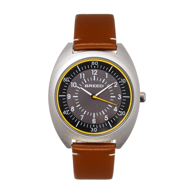 Matte Alloy Case; Japanese Seiko PC21S Quartz Movement; Non-Glare Scratch-Resistant Mineral Crystal; Logo-Engraved Stainless Steel Caseback; Genuine Leather Strap; Logo-Engraved Stainless Steel Clasp; Luminous Hands; 43mm Diameter; 5 ATM Water Resistance;