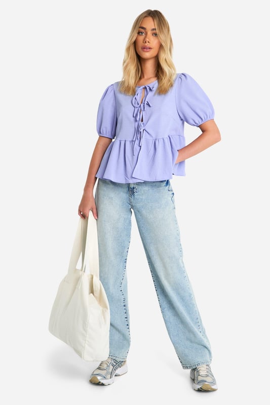 Look hot in this pretty smock top, fresh from our latest arrivals. Made from gathered fabric that's designed to stretch, a smock top is skin tight at the top and falls loosely for a flattering fit on all shapes and sizes. Cut to a practical shape, effortless style is made easier with a smocked blouse or top, the perfect throw-on piece you can team with jeans for everyday wear. From laidback crew necks to criss-cross backs, our latest edit is full of fun laid back pieces - choose yours today.Style: Smock TopLength: RegularSleeve Length: Long Sleeve