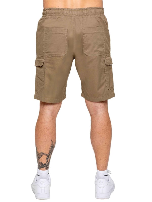 Upgrade your casual wardrobe with the Kruze Chino Cargo Shorts, designed for both comfort and functionality. Featuring a mid-rise, regular fit, these shorts offer a laid-back look. The elasticated waistband with an adjustable drawstring ensures a secure and custom fit. Equipped with two side slash pockets, two spacious cargo pockets with Velcro fastening, and two back pockets, these shorts provide ample storage for your essentials. Crafted from durable, non-stretch chino fabric, they are perfect for everyday wear. Pack of two. Beige & Navy