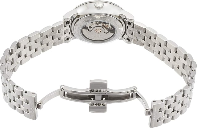 This Tissot Carson Premium Analogue Watch for Women is the perfect timepiece to wear or to gift. It's Silver 30 mm Round case combined with the comfortable Silver Stainless steel watch band will ensure you enjoy this stunning timepiece without any compromise. Operated by a high quality Automatic movement and water resistant to 5 bars, your watch will keep ticking. The Tissot Carson, an all-timer which will suit any time or place, will be the perfect partner to accompany you to every great occasion in your life so that every moment you live is right on time. This Analogue watch has a calendar function: Date and has a Swiss Made Movement High quality 19 cm length and 14 mm width Silver Stainless steel strap with a Deployment clasp Case diameter: 30 mm,case thickness: 10 mm, case colour: Silver and dial colour: Silver