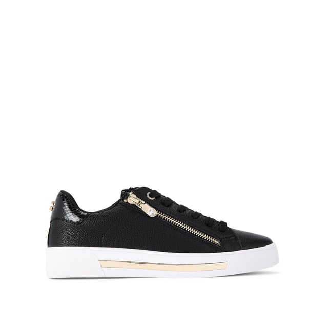 The Carvela Diamond Zip trainer features a black upper with multiple textures. The front laces up with gold tone tabs across the lace up front and foil embossed branding on the tongue.