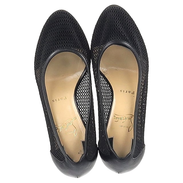VINTAGE, RRP AS NEW
Step into timeless sophistication with the Christian Louboutin Filomena 85 Pumps in sleek black mesh and leather. These exquisite pumps feature a classic silhouette that effortlessly enhances your wardrobe, combining luxurious materials with Louboutin’s signature flair. The 85mm heel strikes the perfect balance between comfort and height, making them ideal for both day and night. With their alluring design and iconic red sole, these pumps are perfect for making a statement at any occasion. Elevate your style with the ultimate blend of elegance and boldness.

Christian Louboutin Filomena 85 Pumps in Black Mesh and Leather

Condition: Very good
Signs of wear: Minor markings, Lightly used but very well maintained. Minor mark at soles & creasing, light scuffing at the soles and heels.
Packaging: None
Color: Black
Material: Polyester
Size: FR37.5/UK3.5/IT36.5/US6.5
Measurements: Heel height: 90; Insole length: 260
SKU: NAPPUGBSH398061W