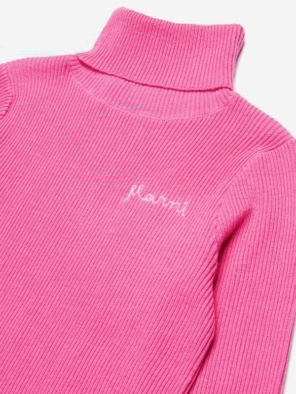 Introducing the Marni Girls Knitted Roll Neck Jumper in Pink, a chic addition to the AW2024 collection. Impeccably tailored for the fashionable young girl, this jumper spells elegance and comfort. Key features include:‚ Luxurious Feel: Crafted with the finest yarns for a soft, enveloping feel.‚ Stylish Comfort: Roll neck design keeps warm while ensuring a stylish look.‚ Vibrant Pink Shade: Brightens any outfit with a playful touch.Elevate your girl's wardrobe this season with Marni's exclusive design!