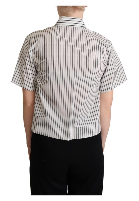 A estrenar con etiquetas.
  Polo de algodon 100% autentico de Dolce & Gabbana.
  Diseno de rayas en blanco y negro.
  Cuello tapeta de botones en la parte delantera y mangas cortas.
  Detalles del logotipo.
  Fabricado en Italia.