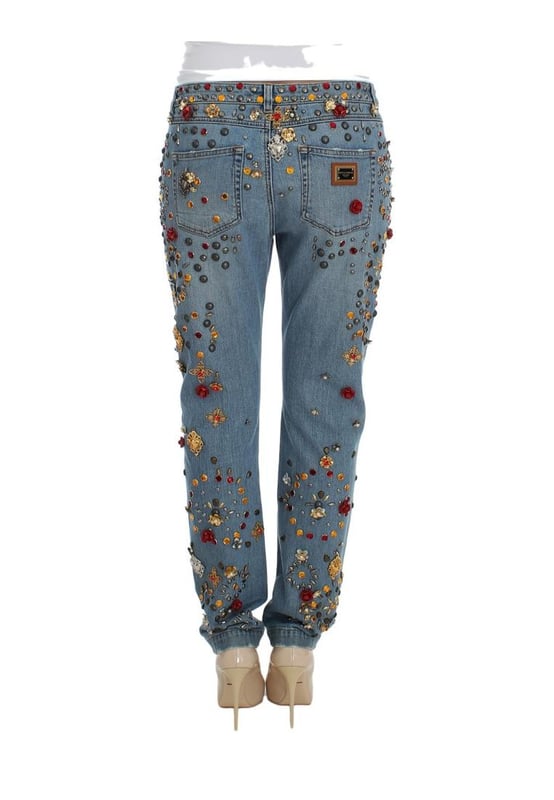Gorgeous brand new Dolce & Gabbana blue wash crystal heart Roses embellished enchanted Sicily boyfriend fit jeans
  Made from a blend of 69% cotton 15% brass 5% crystal 5% zama 3% plastic 2% glass and 1% elastane
  Light blue wash with gold and silver metal detailing
  Zipper and button fly closure
  Multicolor crystal embellishments
  Two front pockets and back pockets
  Logo details
  Made in Italy
  Exclusive and rare one of a kind pair of jeans
Material: 69% Cotton 15% Brass 5% Crystal 5% Zama 3% Plastic 2% Glass 1% Elastane