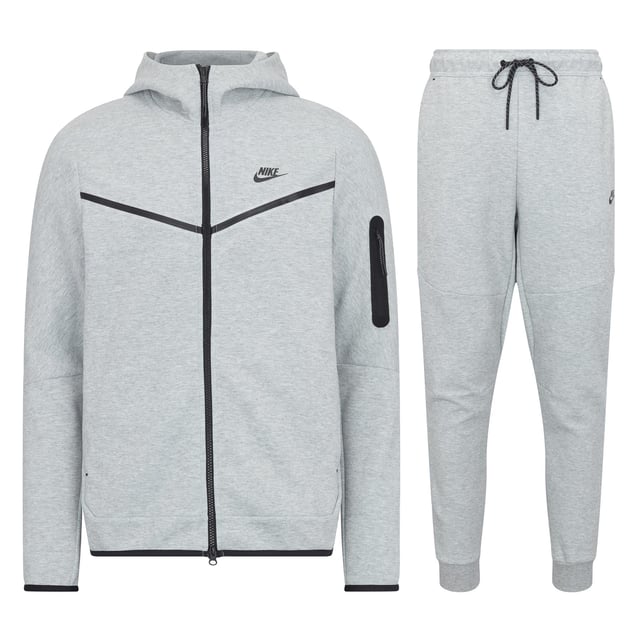 Nike Sportswear Tech Fleece Full Zip Tracksuit Grey Upgrade your wardrobe with the Nike Sportswear Tech Fleece Tracksuit Set, designed for modern comfort and style. Featuring the iconic Tech Fleece Full-Zip Hoodie and Tapered Joggers, this set offers premium warmth without the bulk, making it an essential choice for everyday wear and casual outings.
Key Features:
Tech Fleece Fabric: Engineered with lightweight, double-sided fabric for superior insulation and a sleek, streamlined appearance.
Full-Zip Hoodie:
Panelled hood for enhanced coverage and warmth.
Split kangaroo pockets for convenient storage.
Durable, bonded zipper with a smooth glide and signature tape detailing.
Tapered Joggers:
Tapered fit with ribbed cuffs for a clean, modern silhouette.
Zippered side pocket with bonded trim for secure storage of small essentials.
Elastic waistband with an adjustable drawcord for a personalised fit.
Composition:
Body: 66% Cotton / 34% Polyester
Pocket Bag Palm Side: 69% Cotton / 31% Polyester
Pocket Bag Knuckle Side: 100% Cotton
Why You’ll Love It:
The Nike Sportswear Tech Fleece Tracksuit Set is designed to keep you warm while maintaining a lightweight feel. The hoodie’s structured hood and sleek zipper details complement the joggers' tapered leg for a streamlined, stylish finish. Whether you're on the go or relaxing, this tracksuit offers the perfect combination of functionality and fashion.
Pair it with your favourite Nike sneakers for an effortlessly cool look.