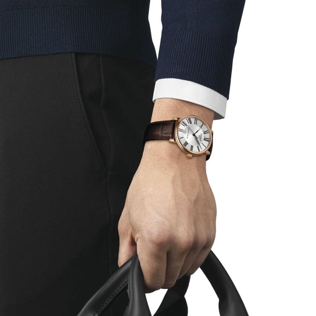 This Tissot Carson Premium Analogue Watch for Women is the perfect timepiece to wear or to gift. It's Rose Gold 30 mm Round case combined with the comfortable Brown Leather watch band will ensure you enjoy this stunning timepiece without any compromise. Operated by a high quality Automatic movement and water resistant to 5 bars, your watch will keep ticking. This high quality watch has an automatic watch movement ( recharged by any movement with your wrist; never needs a battery) - This Analogue watch has a calendar function: Date, Swiss Made High quality 19 cm length and 15 mm width a Brown Leather strap with a Buckle Case diameter: 30 mm,case thickness: 10 mm, case colour: Rose Gold and dial colour: Silver