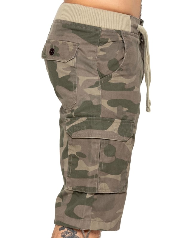 Effortlessly stylish and luxurious, Enzo offers Enzo Mens Camo Combat Cuffed Shorts with an elasticated waist featuring a drawcord and secured by a sophisticated button. These shorts are available in 3 elegant colours: Beige, Grey, and Vintage. The mid-rise design and ribbed waist add a touch of sophistication, while the 2 front pockets, 2 buttoned back pockets, and 2 velcro side pockets provide both function and fashion.