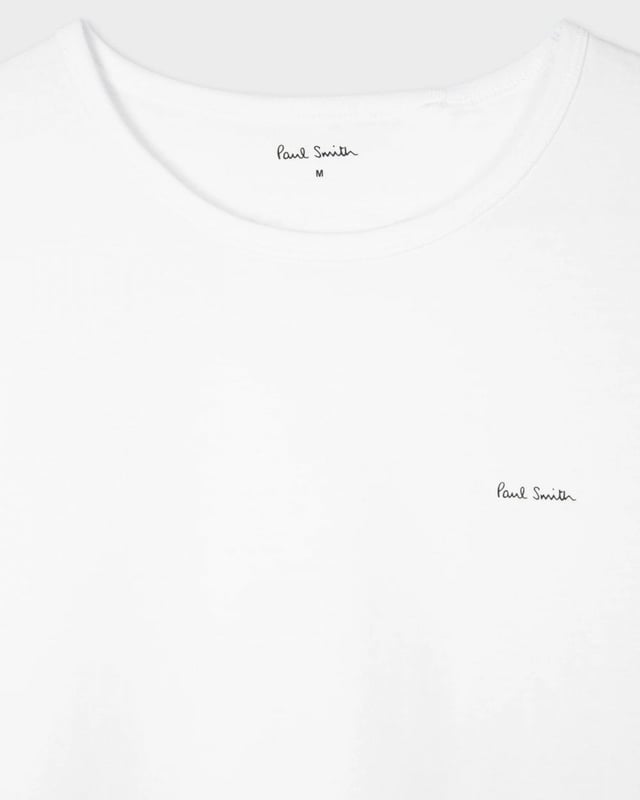 Made from 100% organic cotton, this five pack of mixed colour crew neck T-shirts feature a small Paul Smith logo print on the chest and inside the collar. Designed for a comfortable fit, this loungewear essential will seamlessly elevate your everyday wardrobe.

100% Organic Cotton

M1A-389-M5PK