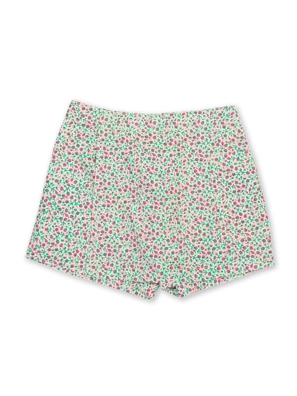 100% organic cotton | Proud to be certified to the Global Organic Textile Standard (GOTS) | Little bud all-over print | Twill fabric | Skirt with matching built-in shorts | Elasticated waistband | Made in India | Machine washable at 40 degrees, or at 30 degrees to be kinder to the planet