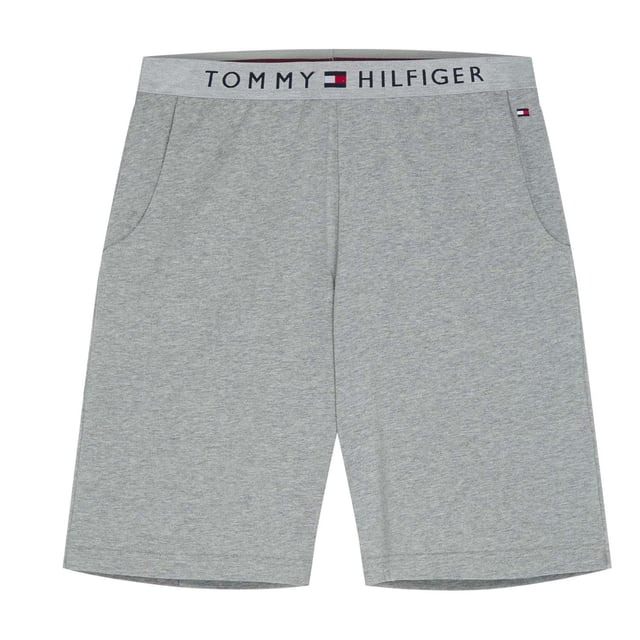 Mens Tommy Hilfiger Jersey Loungewear Shorts in grey.- Branded elasticated waistband.- Pouch pockets.- Embroidered Tommy Hilfiger Flag logo is situated on the left hip.- Regular fit.- Ref: UM0UM01203004