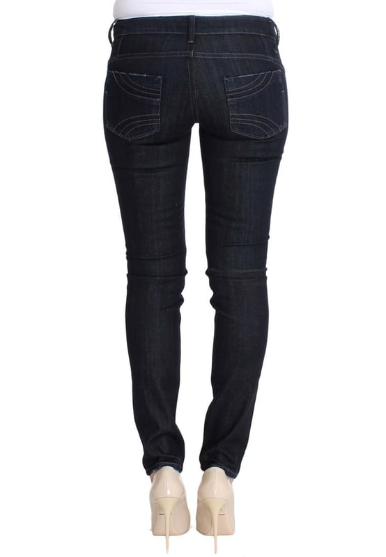 Merk: Costume National CNC
  Pasvorm: Slim fit skinny
  Kleur: Blauw
  Materiaal: 97% Katoen 3% Elastaan
  Gulp: Gulp met rits
  Zakken: Twee voor
  en twee achterzakken
  Details: Logo details
  Herkomst: Gemaakt in Italie