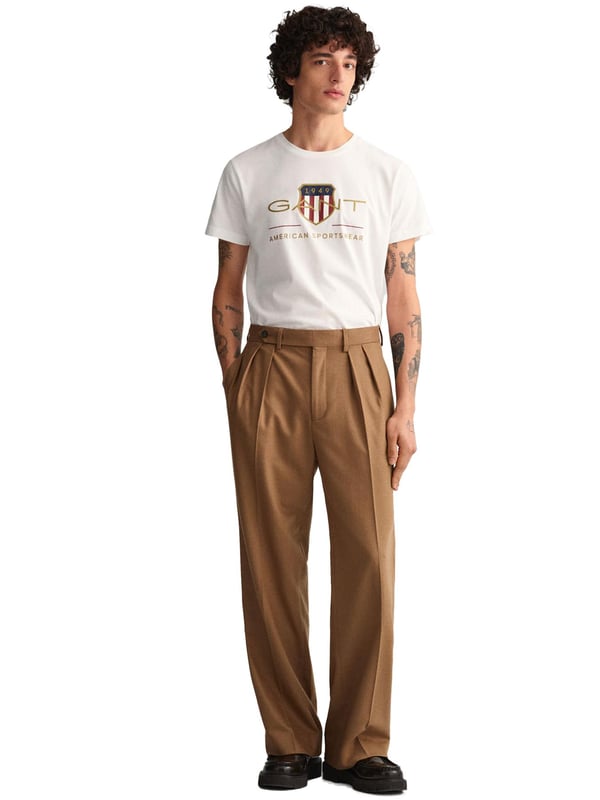 Mens Designer Gant Archive Shield T-Shirts feature Short Sleeves and a Crew Neckline. Gant Logo Printed on chest. Crafted With 100% Cotton, these Lightweight and breathable Regular Fit T-shirts are Machine Washable.