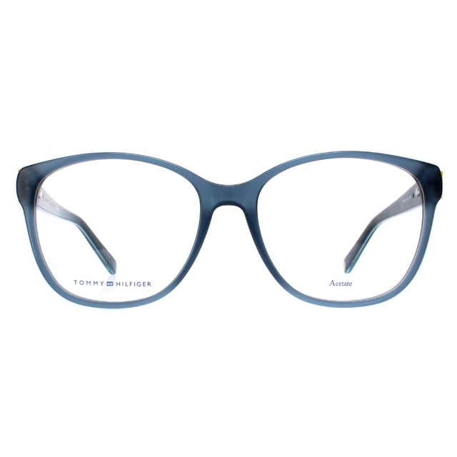 Tommy Hilfiger Square Womens Blue Glitter TH1780  Glasses feature a lightweight and durable square frame that provides a comfortable and secure fit. The temples are adorned with the iconic Tommy Hilfiger logo, adding a touch of elegance and sophistication to the overall look.