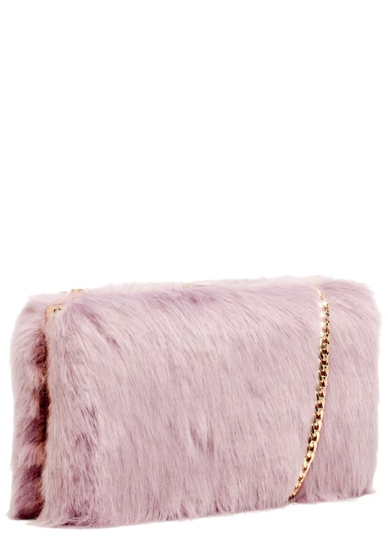 A girls wardrobe is never too full of fabulous bags! Set the trend this season with this funky and tactile faux fur Pandora clutch bag- the must have statement look. Inside is lined with fuchsia twill lining and the handy slip pocket- perfs for your party night essentials! It comes with a fierce detachable gold chain shoulder strap so you can switch up the style to suit whatever outfit you are slayin. Features: , Tactile faux fur exterior, Metal frame and clasp, Detachable chain shoulder strap, Fuschia twill lining, Inner slip pocket Style Ref: 81853 LILAC