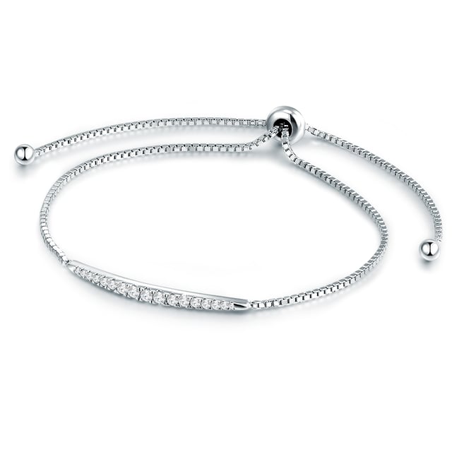 Do you like minimalist-modern jewelry designs with a touch of glamor? Then in no time you will fall in love with this bridal jewelry bracelet of the 1934 label! A composition of different sizes of zirconia crystals sparkles on a delicate box chain made of 925 sterling silver, which capture the light in the countless facets of the precise brilliant cut. A high-quality rhodium finishing protects the polished surface from starting. Practical: With the help of the train closure, the length of the bracelet can be easily and continuously adapted to the wrist.