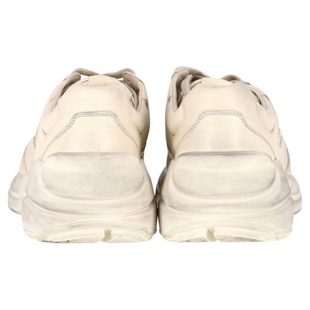 VINTAGE, RRP AS NEW
Luxury with an Edge: Embrace luxury with an edge in the Gucci Distressed Rhyton Sneakers in White Leather. The high-quality leather and distressed finish create a unique juxtaposition of elegance and ruggedness. These sneakers are ideal for individuals who seek a luxurious yet effortlessly laid-back footwear option that makes a statement.

Gucci Distressed Rhyton Sneakers in White Leather
Condition: Very good
Signs of wear: Include Box., Minor markings, Lightly used but very well maintained. Minor mark at soles & creasing, light scuffing at the soles and heels.
Packaging: Box, Dust bag
Color: White | ecru
Material: Leather
Size: EU37.5
Measurements: Heel height: 50; Insole length: 280
SKU: NAPPUGBSH370869W