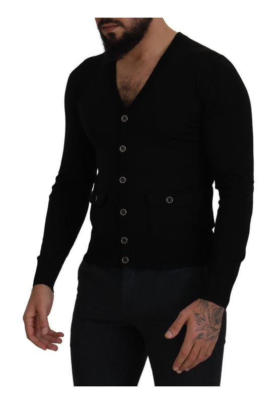 100% authentic Dolce & Gabbana cardigan sweater
  Crafted from Quality wool
  Classic black color
  Full button closure
  Logo details
  Made in Italy
  Material: 100% Virgin Wool