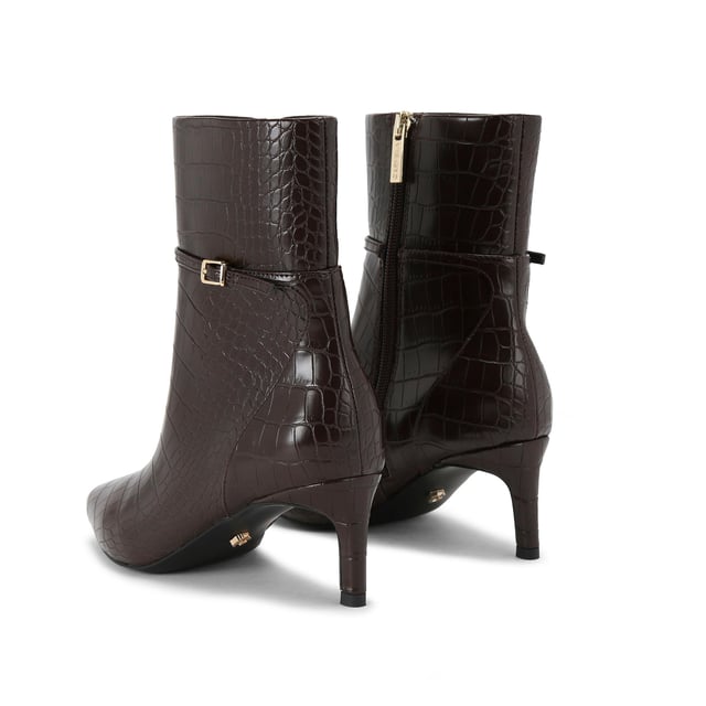 This KG Kurt Geiger Impress Ankle Boot features a brown croc embossed upper. There is a thin ankle strap around the ankle with gold tone buckle. Heel height: 6cm.