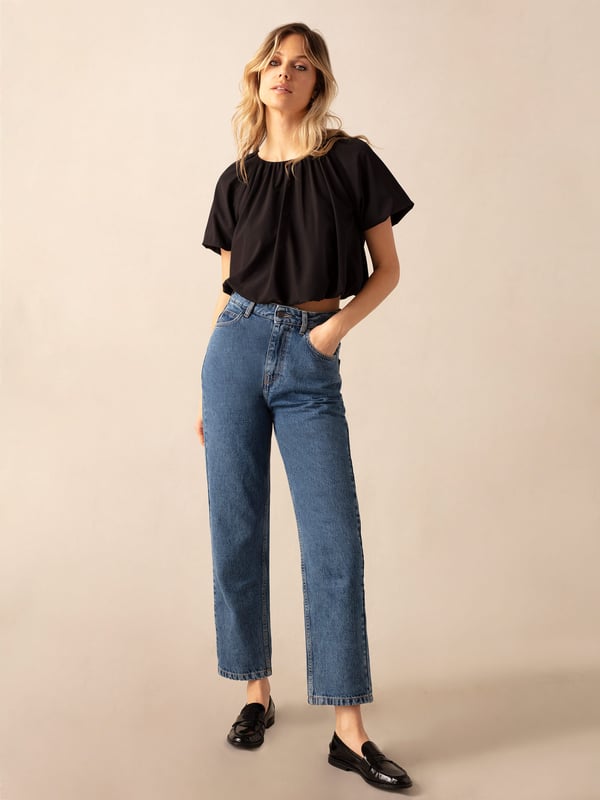 Co-founders' Notes

Introducing the Parachute Top, a relaxed fit with a subtle bubble hem and soft volume short sleeves. This lined style features a discreet zip at the back neck for added convenience. Crafted from lightweight fabric that feels effortlessly comfortable, this shorter length top pairs seamlessly to the waistband of our matching skirt for a laid-back and coordinated look.

Lined

Zip at back neck
Short length top
Relaxed fit. Try your usual size



Fabric &amp; Care



Composition: Main: 92% Polyester 8% Elastane Lining: 100% Viscose


Garment Care: Machine washable



Size &amp; Fit


Relaxed fit. Try your usual size

Length: 46cm (size 10)

Model is 170 cm/5'7" and is wearing a size 10