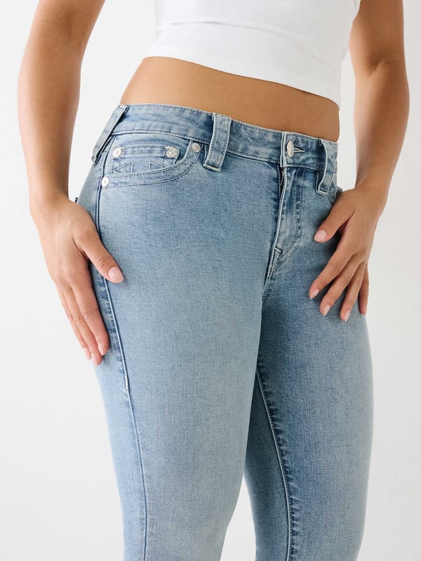 The Jennie is a skinny built for curves. This mid rise women's curvy skinny jean prevents gapping at the waistband and is specially designed to maximize shape retention tHIGH RISEoughout the day. Featuring subtle fading, clean hardware, and white stitching. Finished with 1/2" horseshoes along the back pockets.