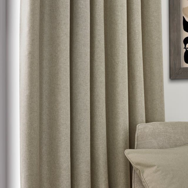 Transform your living space with Dawn Blackout Pencil Pleat Curtains, designed for those who value elegance and practicality. Crafted from soft-textured fabric with a modern marl effect, these curtains add refined style to any room while effectively blocking out light. Perfect for a restful night's sleep or creating the ideal movie-watching environment, their temperature-regulating properties ensure comfort year-round by keeping your home cool in summer and warm in winter. Enjoy the perfect blend of function and style with Dawn Blackout Curtains.