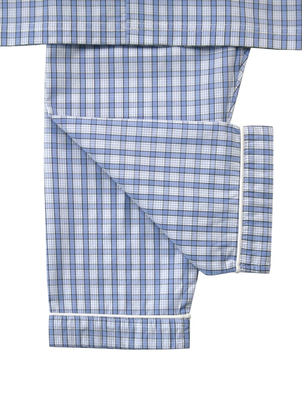 Boys mini check PJ set in shades of mid blue. Spring & Summer weight 100% Cotton with short sleeves
Classic traditional styling, engraved pearl effect buttons and contrast piping. With an elastic waist, making them easy to get on and off 
100% Cotton
Elastic waist
Front pocket
Button through top
Machine washable
Contrast piping detail