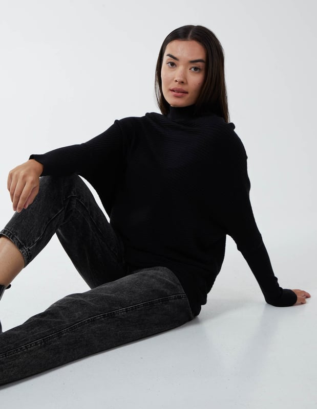 What do we want in Winter? We want to be warm, comfortable and yes€¦ the best we can look anywhere we go. Which why our highly elasticated batwing jumper with a high neckline is a close friend of ours. It's here when we go to work, a casual weekend, or a night out. And it puts us in a particularly good mood when styled with a pleated skirt and high knee boots.