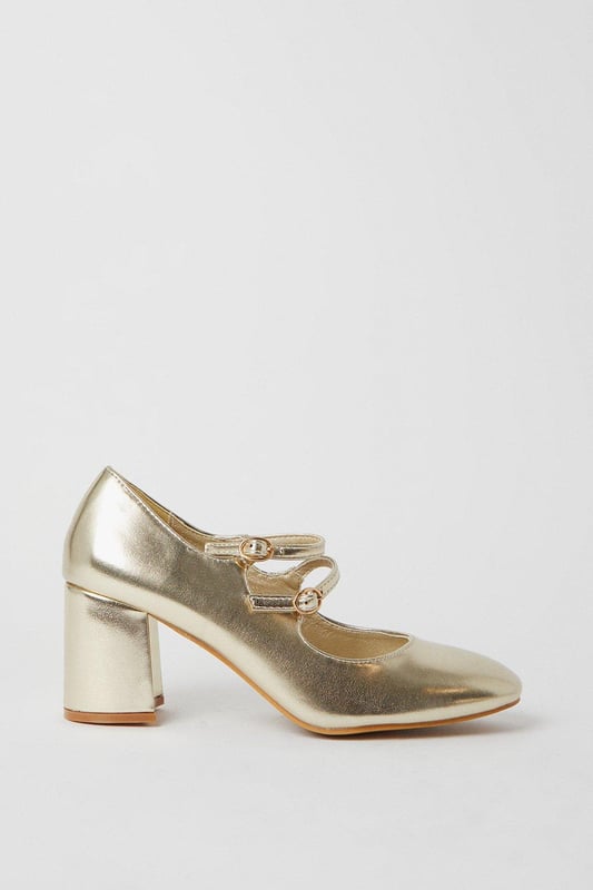 High-shine metallic finish
Block heel for stability  
Almond toe shape
Double Mary Jane straps with buckles
Reinforced heel cap for durability

These versatile metallic court shoes from Dorothy Perkins are perfect for both day and evening wear. Their contemporary double strap design with silver-toned buckles lends visual interest, while the mid-height block heel offers comfort and stability. 

Pair with cropped trousers or a flared skirt for a smart daytime look. For evenings out, match with a dress or trousers to complement the metallic shine. The reinforced heel cap gives durability for all-day wear. With their sleek silhouette and modern accents, these shoes will become a go-to in your wardrobe.