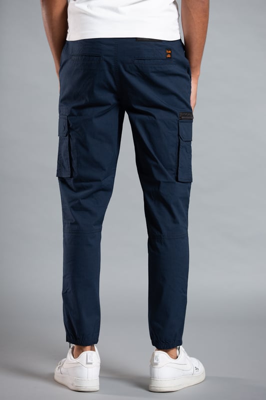 These cargo-style trousers from Tokyo Laundry are wardrobe staples. Made from soft cotton blend fabric, these trousers are perfect for everyday wear. Featuring two side pockets, two cargo-style pockets with zips, button fastening with belt loops, zips at the hem and Tokyo Laundry branding. Machine washable for easy care.