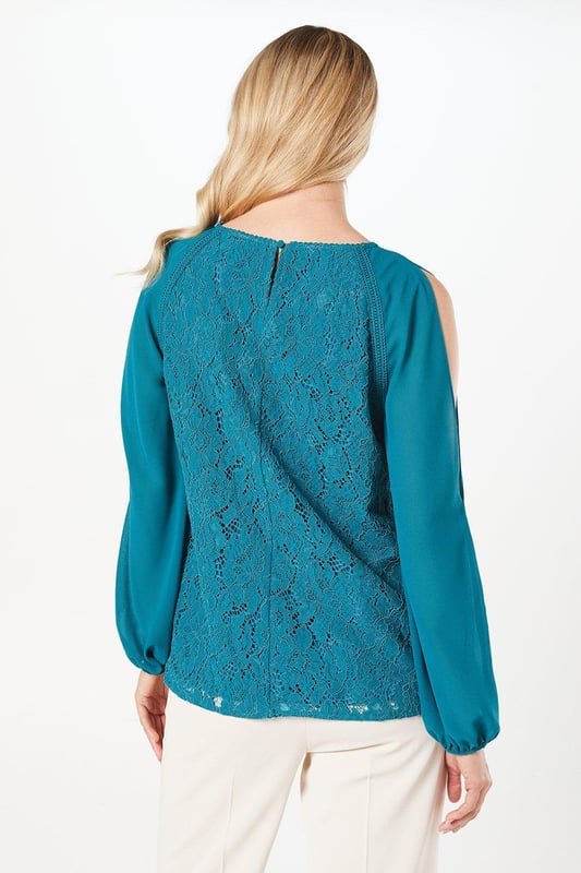 Featuring a delicate lace fabric and elegant chiffon sleeves, this top is not only stylish but also comfortable to wear. This is the perfect top to wear for any occasion! Stay on-trend and express your unique style with this Premium Lace  Sleeve Top.